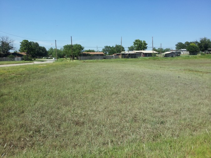 Detention pond in eastern Abilene before a rainstorm.